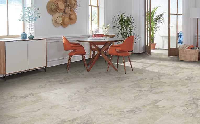 luxury vinyl tile with orange chairs